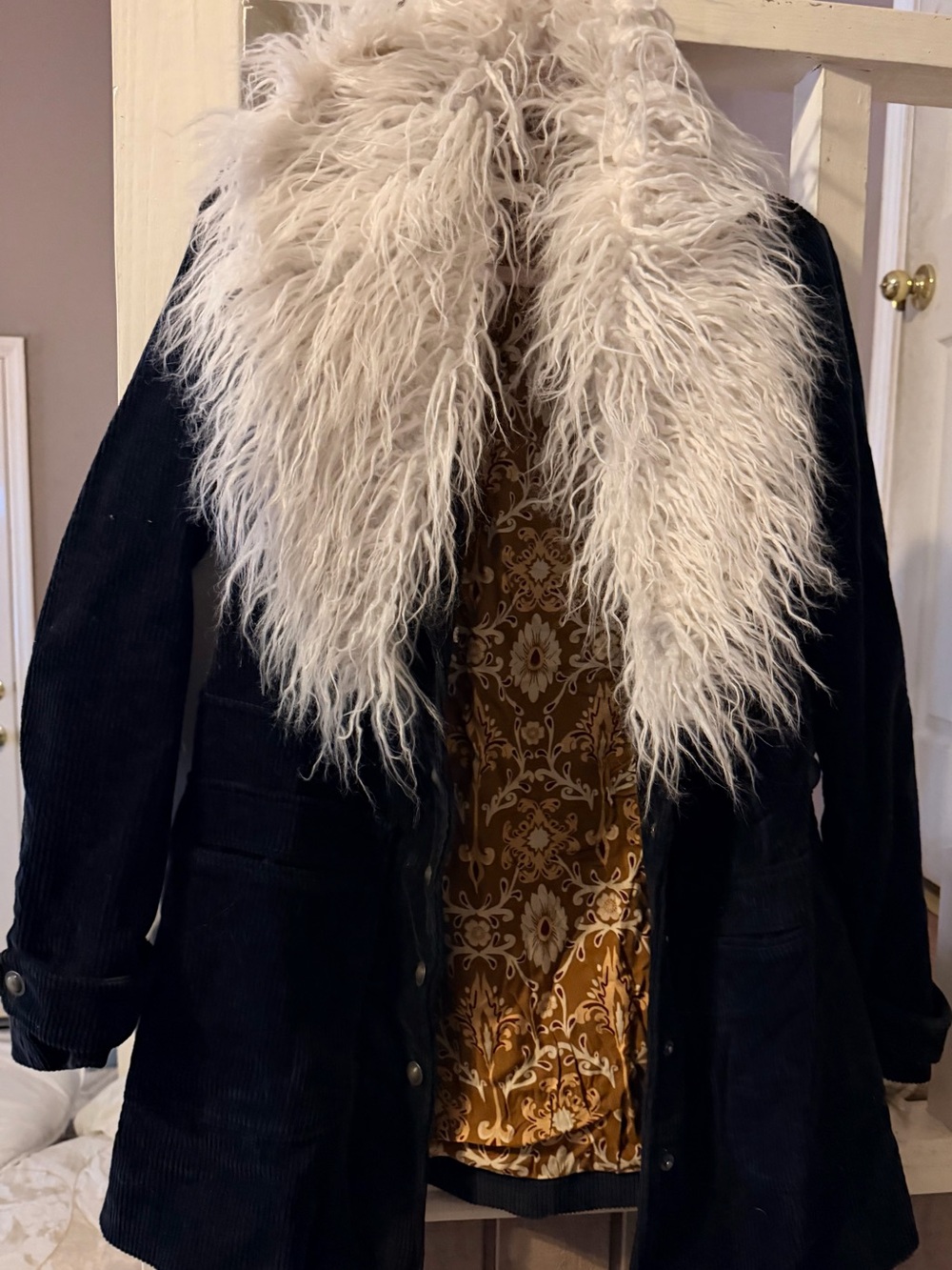 Free People corduroy coat with removable fur around the collar.